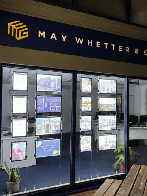 Claralight LED light pockets in estate agency window