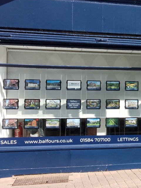 Claralight LED light pockets in estate agency window
