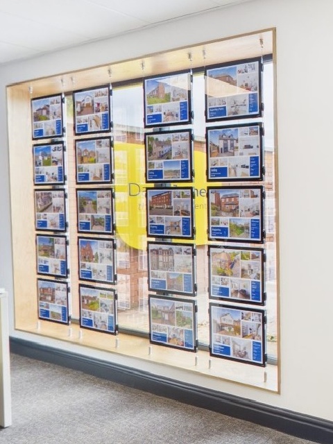 Claralight LED light pockets in estate agency window